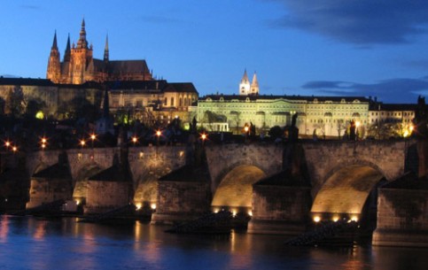 Prague Castle is one of the biggest castles in the world. It includes gothic St Vitus Cathedral, Romanesque Basilica of St. George, a monastery and several palaces, gardens and defense towers 