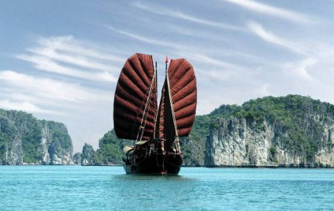 Hạ Long Bay is a UNESCO World Heritage Site. Thousands of tiny islands, rising out of transparent emerald water; fine beaches and fabulous grottos, created by waves and wind